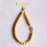 Phone cord beads with fish - yellow